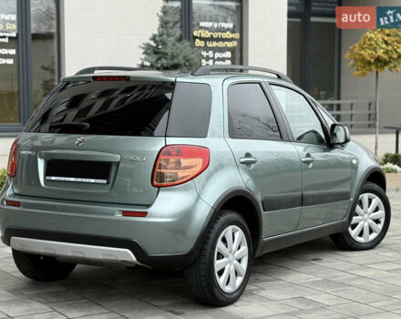 Зеленый Сузуки СХ4, объемом двигателя 1.6 л и пробегом 164 тыс. км за 8950 $, фото 3 на Automoto.ua