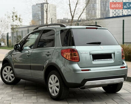 Зеленый Сузуки СХ4, объемом двигателя 1.6 л и пробегом 164 тыс. км за 8950 $, фото 5 на Automoto.ua
