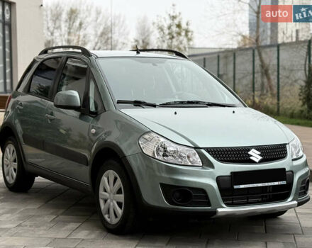 Зеленый Сузуки СХ4, объемом двигателя 1.6 л и пробегом 164 тыс. км за 8950 $, фото 1 на Automoto.ua