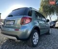 Зелений Сузукі СХ4, об'ємом двигуна 1.6 л та пробігом 224 тис. км за 8800 $, фото 1 на Automoto.ua