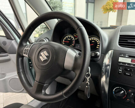 Зеленый Сузуки СХ4, объемом двигателя 1.6 л и пробегом 164 тыс. км за 8950 $, фото 12 на Automoto.ua