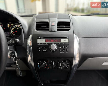 Зеленый Сузуки СХ4, объемом двигателя 1.6 л и пробегом 164 тыс. км за 8950 $, фото 13 на Automoto.ua