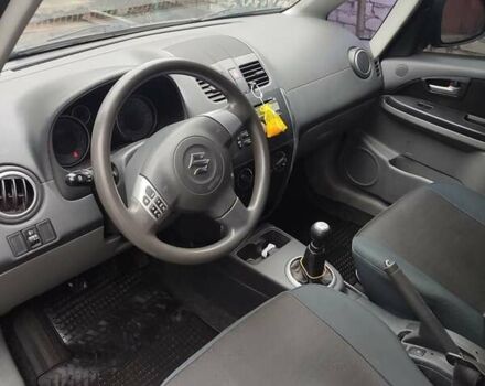 Зеленый Сузуки СХ4, объемом двигателя 1.59 л и пробегом 173 тыс. км за 7500 $, фото 8 на Automoto.ua