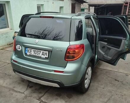 Зеленый Сузуки СХ4, объемом двигателя 1.59 л и пробегом 173 тыс. км за 7500 $, фото 1 на Automoto.ua