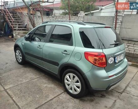 Зеленый Сузуки СХ4, объемом двигателя 1.59 л и пробегом 173 тыс. км за 7500 $, фото 3 на Automoto.ua