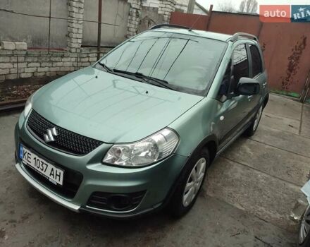 Зеленый Сузуки СХ4, объемом двигателя 1.59 л и пробегом 173 тыс. км за 7500 $, фото 2 на Automoto.ua