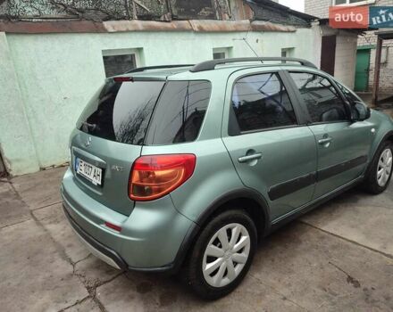 Зеленый Сузуки СХ4, объемом двигателя 1.59 л и пробегом 173 тыс. км за 7500 $, фото 4 на Automoto.ua
