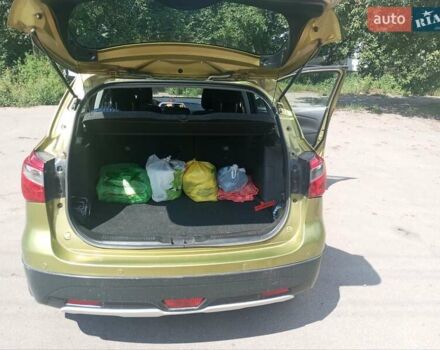 Зеленый Сузуки СХ4, объемом двигателя 1.59 л и пробегом 86 тыс. км за 11500 $, фото 5 на Automoto.ua