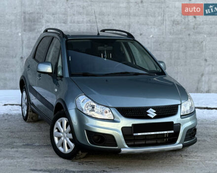 Зеленый Сузуки СХ4, объемом двигателя 1.6 л и пробегом 164 тыс. км за 8990 $, фото 1 на Automoto.ua