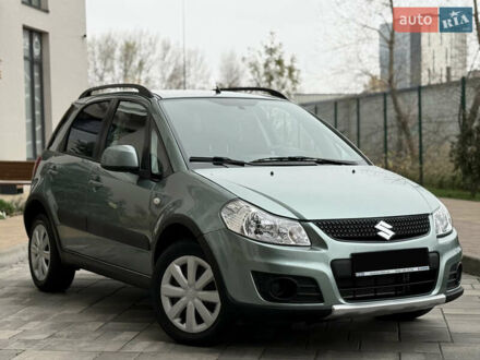 Зеленый Сузуки СХ4, объемом двигателя 1.6 л и пробегом 164 тыс. км за 8950 $, фото 1 на Automoto.ua