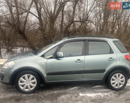 Зелений Сузукі СХ4, об'ємом двигуна 1.59 л та пробігом 126 тис. км за 8900 $, фото 1 на Automoto.ua