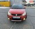 Помаранчевий Сузукі СХ4, об'ємом двигуна 2 л та пробігом 230 тис. км за 7400 $, фото 1 на Automoto.ua