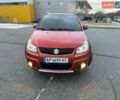Помаранчевий Сузукі СХ4, об'ємом двигуна 2 л та пробігом 230 тис. км за 5200 $, фото 2 на Automoto.ua