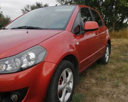 Оранжевый Сузуки СХ4, объемом двигателя 1.59 л и пробегом 202 тыс. км за 6300 $, фото 6 на Automoto.ua