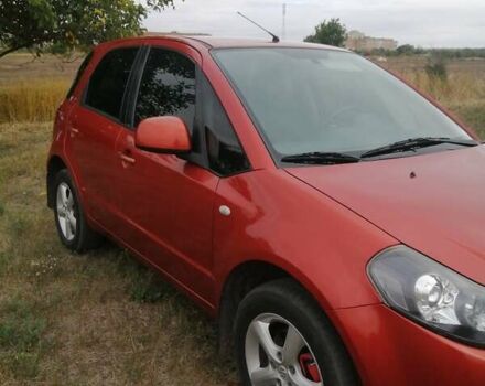 Оранжевый Сузуки СХ4, объемом двигателя 1.59 л и пробегом 202 тыс. км за 6300 $, фото 5 на Automoto.ua