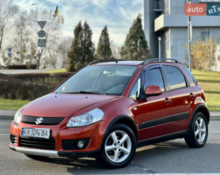 Помаранчевий Сузукі СХ4, об'ємом двигуна 1.6 л та пробігом 202 тис. км за 7200 $, фото 1 на Automoto.ua