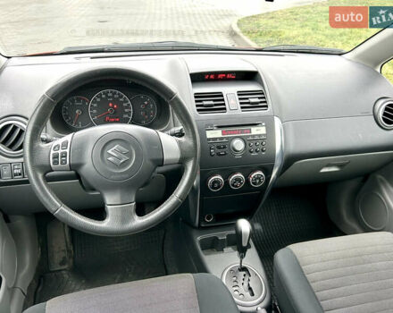 Помаранчевий Сузукі СХ4, об'ємом двигуна 1.6 л та пробігом 240 тис. км за 7500 $, фото 28 на Automoto.ua