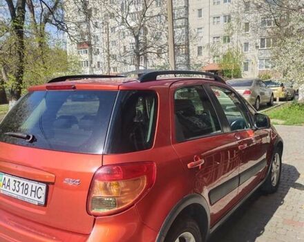 Оранжевый Сузуки СХ4, объемом двигателя 1.59 л и пробегом 172 тыс. км за 7600 $, фото 2 на Automoto.ua