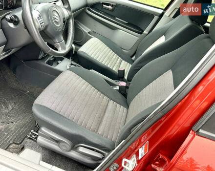 Помаранчевий Сузукі СХ4, об'ємом двигуна 1.6 л та пробігом 240 тис. км за 7500 $, фото 23 на Automoto.ua