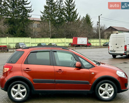 Помаранчевий Сузукі СХ4, об'ємом двигуна 1.6 л та пробігом 240 тис. км за 7500 $, фото 3 на Automoto.ua