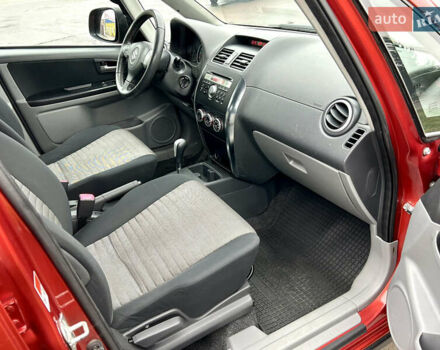 Помаранчевий Сузукі СХ4, об'ємом двигуна 1.6 л та пробігом 240 тис. км за 7500 $, фото 33 на Automoto.ua