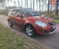Оранжевый Сузуки СХ4, объемом двигателя 1.6 л и пробегом 202 тыс. км за 6100 $, фото 1 на Automoto.ua
