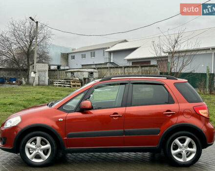 Помаранчевий Сузукі СХ4, об'ємом двигуна 1.6 л та пробігом 240 тис. км за 7500 $, фото 7 на Automoto.ua