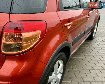 Помаранчевий Сузукі СХ4, об'ємом двигуна 1.6 л та пробігом 240 тис. км за 7500 $, фото 16 на Automoto.ua