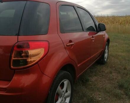 Оранжевый Сузуки СХ4, объемом двигателя 1.59 л и пробегом 202 тыс. км за 6300 $, фото 8 на Automoto.ua