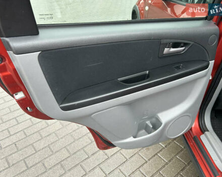 Помаранчевий Сузукі СХ4, об'ємом двигуна 1.6 л та пробігом 240 тис. км за 7500 $, фото 26 на Automoto.ua