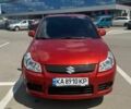 Помаранчевий Сузукі СХ4, об'ємом двигуна 1.59 л та пробігом 236 тис. км за 6500 $, фото 2 на Automoto.ua
