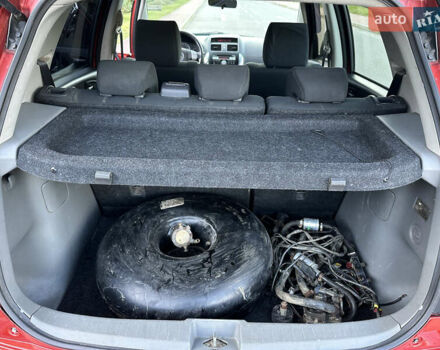 Помаранчевий Сузукі СХ4, об'ємом двигуна 1.6 л та пробігом 202 тис. км за 7200 $, фото 33 на Automoto.ua