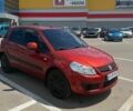 Помаранчевий Сузукі СХ4, об'ємом двигуна 1.59 л та пробігом 236 тис. км за 6500 $, фото 1 на Automoto.ua