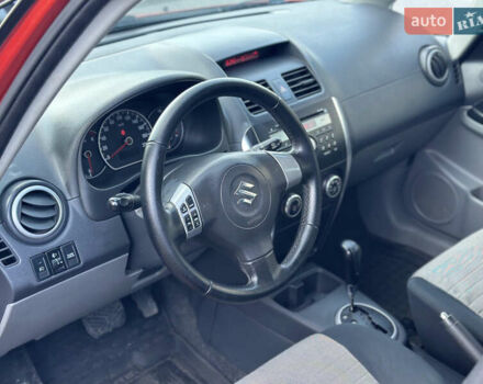 Помаранчевий Сузукі СХ4, об'ємом двигуна 1.6 л та пробігом 202 тис. км за 7200 $, фото 22 на Automoto.ua