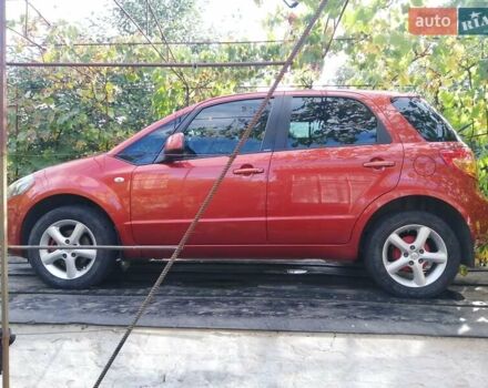 Оранжевый Сузуки СХ4, объемом двигателя 1.59 л и пробегом 202 тыс. км за 6300 $, фото 13 на Automoto.ua