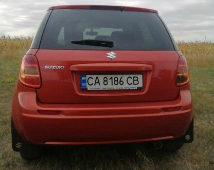 Оранжевый Сузуки СХ4, объемом двигателя 1.59 л и пробегом 202 тыс. км за 6300 $, фото 3 на Automoto.ua