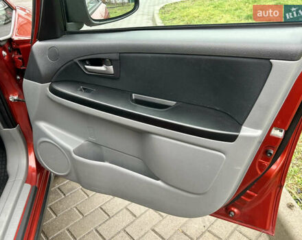 Помаранчевий Сузукі СХ4, об'ємом двигуна 1.6 л та пробігом 240 тис. км за 7500 $, фото 34 на Automoto.ua