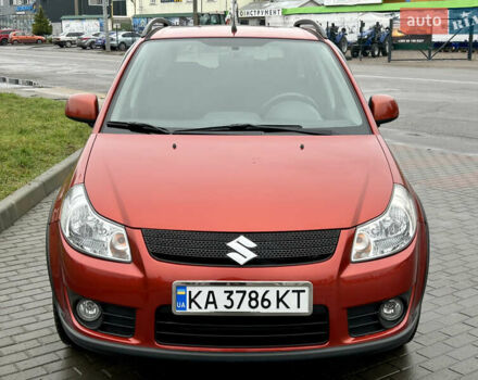 Помаранчевий Сузукі СХ4, об'ємом двигуна 1.6 л та пробігом 240 тис. км за 7500 $, фото 1 на Automoto.ua