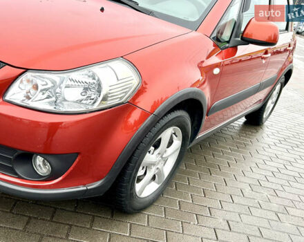 Помаранчевий Сузукі СХ4, об'ємом двигуна 1.6 л та пробігом 240 тис. км за 7500 $, фото 10 на Automoto.ua