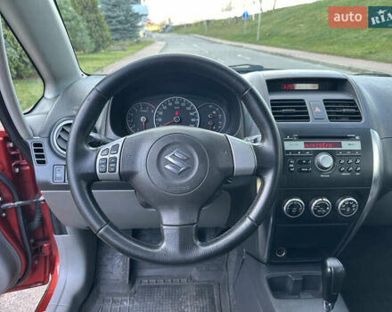 Помаранчевий Сузукі СХ4, об'ємом двигуна 1.6 л та пробігом 202 тис. км за 7200 $, фото 30 на Automoto.ua