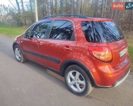 Оранжевый Сузуки СХ4, объемом двигателя 1.6 л и пробегом 202 тыс. км за 6100 $, фото 3 на Automoto.ua