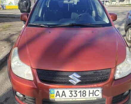 Оранжевый Сузуки СХ4, объемом двигателя 1.59 л и пробегом 172 тыс. км за 7600 $, фото 1 на Automoto.ua