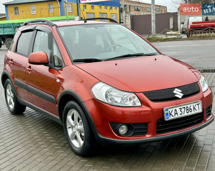 Помаранчевий Сузукі СХ4, об'ємом двигуна 1.6 л та пробігом 240 тис. км за 7500 $, фото 2 на Automoto.ua