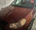 Оранжевый Сузуки СХ4, объемом двигателя 1.6 л и пробегом 240 тыс. км за 6900 $, фото 1 на Automoto.ua