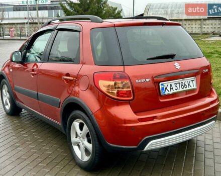 Помаранчевий Сузукі СХ4, об'ємом двигуна 1.6 л та пробігом 240 тис. км за 7500 $, фото 6 на Automoto.ua