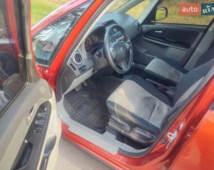 Оранжевый Сузуки СХ4, объемом двигателя 1.6 л и пробегом 202 тыс. км за 6100 $, фото 9 на Automoto.ua