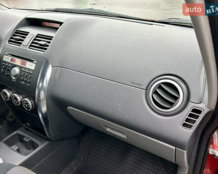 Помаранчевий Сузукі СХ4, об'ємом двигуна 1.6 л та пробігом 240 тис. км за 7500 $, фото 37 на Automoto.ua