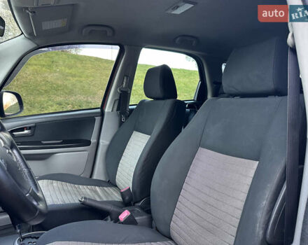 Помаранчевий Сузукі СХ4, об'ємом двигуна 1.6 л та пробігом 202 тис. км за 7200 $, фото 21 на Automoto.ua