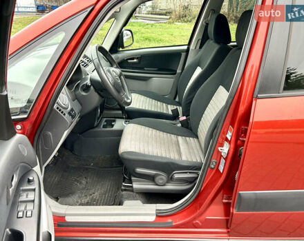 Помаранчевий Сузукі СХ4, об'ємом двигуна 1.6 л та пробігом 240 тис. км за 7500 $, фото 22 на Automoto.ua