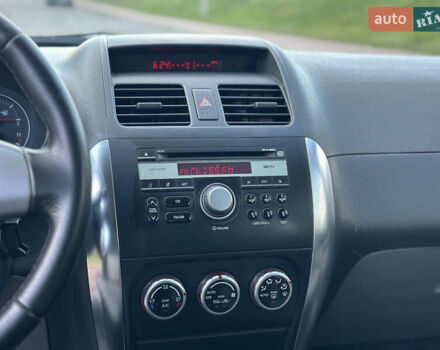 Помаранчевий Сузукі СХ4, об'ємом двигуна 1.6 л та пробігом 202 тис. км за 7200 $, фото 27 на Automoto.ua